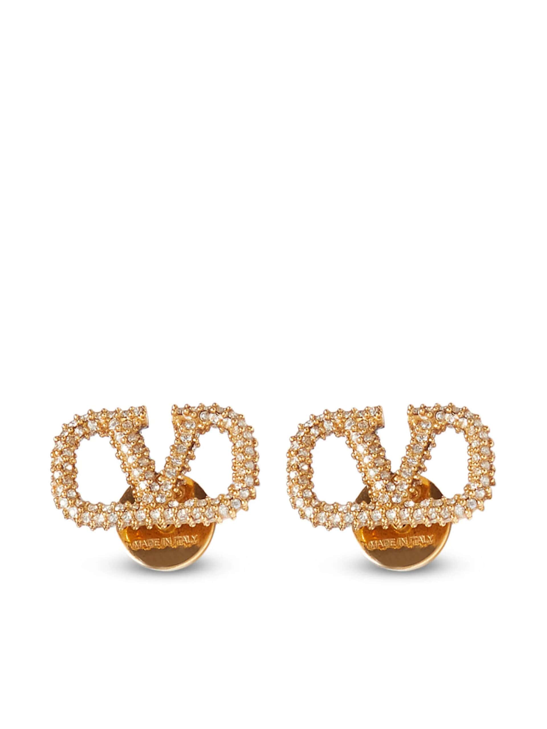 Brincos de ouro com detalhes de cristais e logo da moda Dolce & Gabbana.