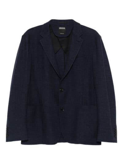 Blazer de homem clássico em tecido escuro, perfeito para looks elegantes e profissionais.